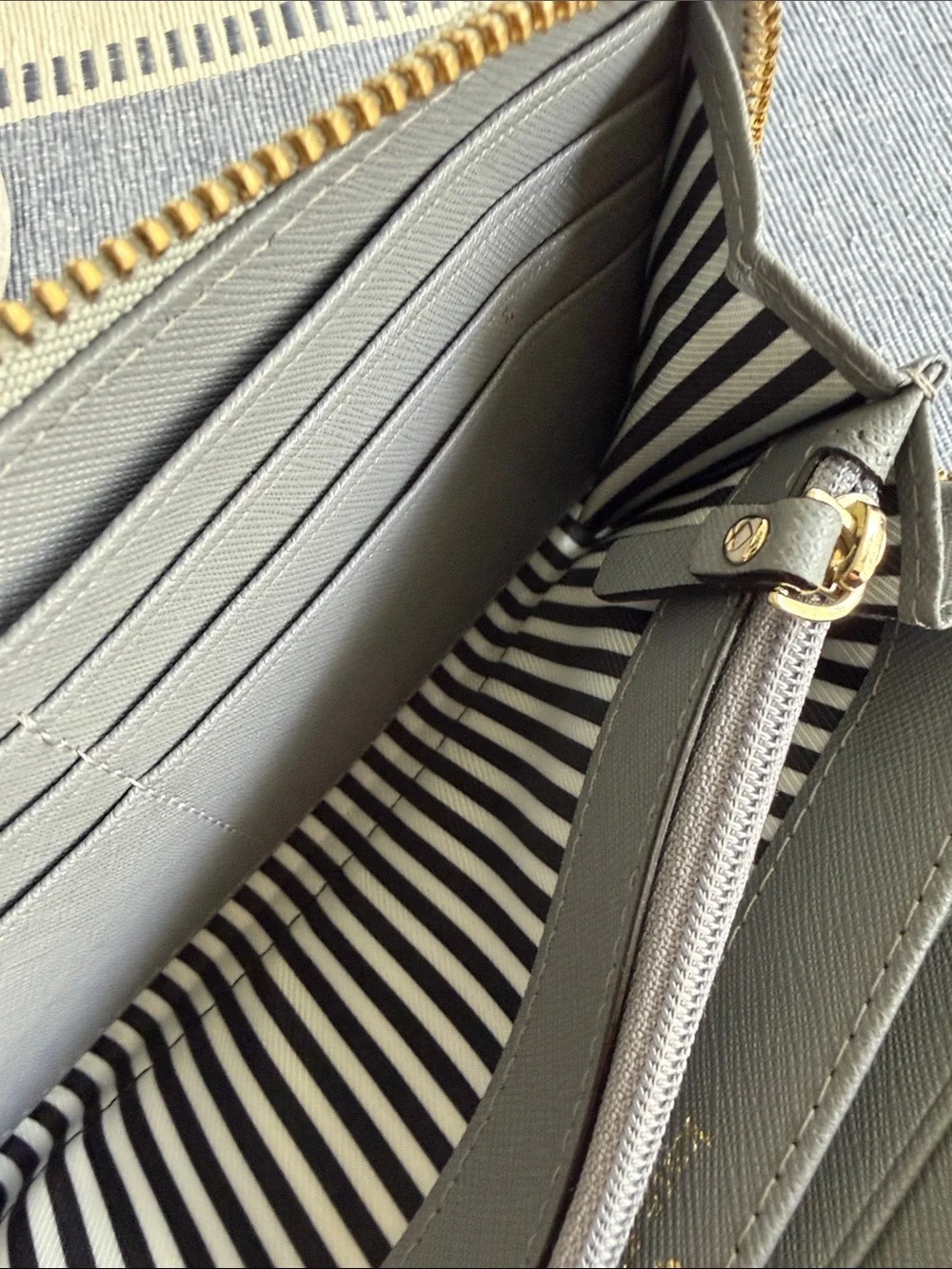 Kate Spade Two-Tone Gray Zip Around Wallet with Gold Hardware